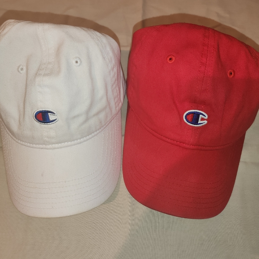 Two Authentic Champion fitted hats.